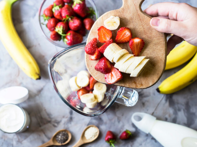 Ingredients,For,Making,Strawberry,Banana,Smoothies,On,A,Gray,Table