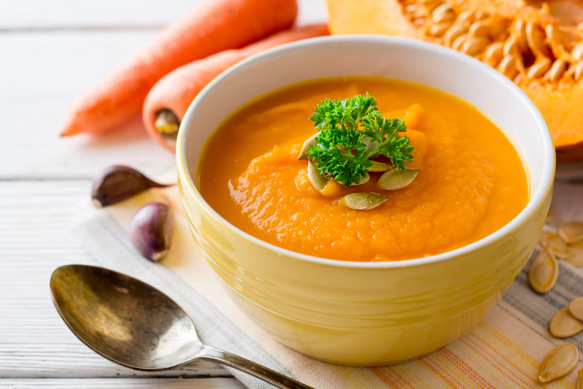 Pumpkin,And,Carrot,Cream,Soup,With,Pumpkin,Seeds,And,Parsley