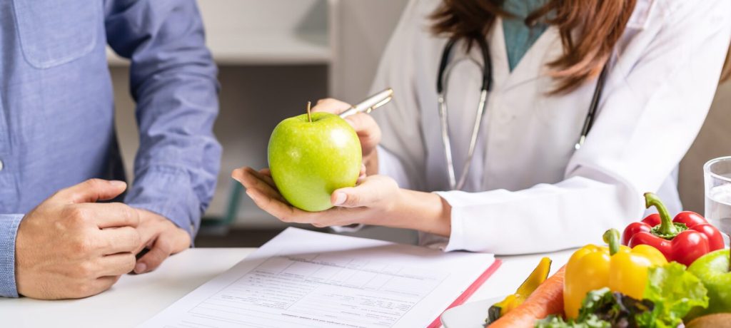 nutritionist-giving-consultation-to-patient-with-h-2026-03-20-00-23-54-utc