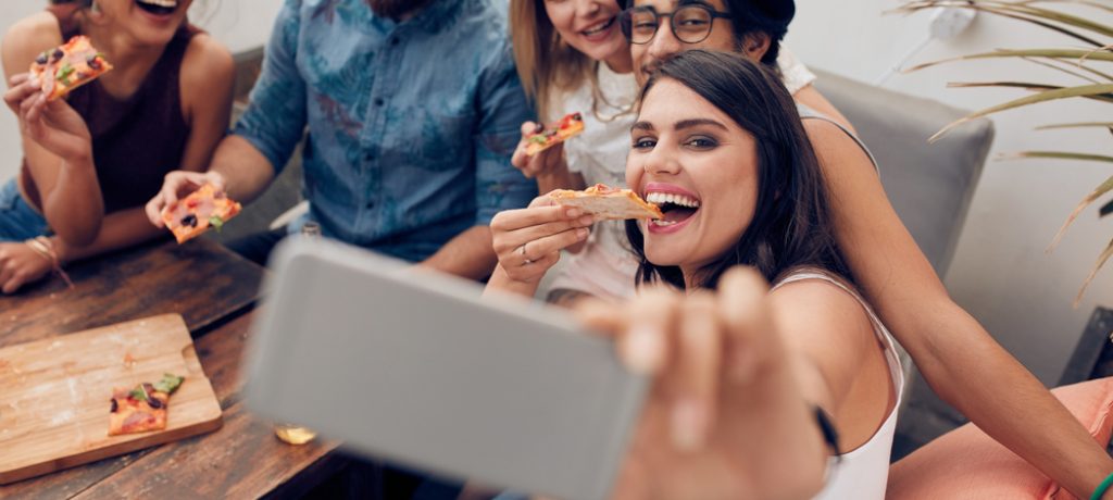 Group,Of,Multiracial,Young,People,Taking,A,Selfie,While,Eating